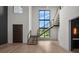 Modern foyer with soaring ceilings, staircase, and hardwood floors at 5038 W Dickens Ave, Tampa, FL 33629