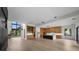 Bright, spacious kitchen with custom wood cabinets, island with marble countertop, and stainless steel appliances at 5038 W Dickens Ave, Tampa, FL 33629