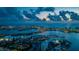 Stunning aerial view of the city skyline and waterfront at twilight at 670 Island Way # 500, Clearwater Beach, FL 33767