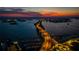Panoramic aerial view of a coastal city with a bridge and skyline at sunset at 670 Island Way # 500, Clearwater Beach, FL 33767