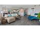 Inviting living room with modern wood floors, open concept kitchen, and stylish furniture at 670 Island Way # 500, Clearwater Beach, FL 33767