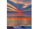 Scenic ocean sunset view with colorful sky and calm waters with waves at 670 Island Way # 500, Clearwater Beach, FL 33767