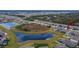 Panoramic aerial shot of the community, showcasing its proximity to ponds and natural landscapes at 12940 Brookside Moss Dr, Riverview, FL 33579