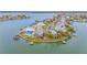 Aerial view of waterfront home with boat dock and beautiful backyard at 16134 4Th E St, Redington Beach, FL 33708