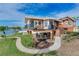 Attractive waterfront home with balcony, well-manicured lawn, and a private boat dock at 16134 4Th E St, Redington Beach, FL 33708