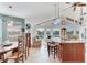 Open concept kitchen with island seating and stunning waterfront views at 16134 4Th E St, Redington Beach, FL 33708