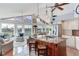 Open concept kitchen with island seating and stunning waterfront views at 16134 4Th E St, Redington Beach, FL 33708