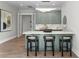 This bar area is great for entertaining with counter seating, great lighting, and plenty of storage at 337 Coffee Pot Ne Dr, St Petersburg, FL 33704