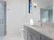 Modern bathroom features a sleek vanity, glass shower, and stylish light fixtures at 337 Coffee Pot Ne Dr, St Petersburg, FL 33704