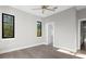 Bright bedroom with hardwood floors, a ceiling fan, and neutral tones at 337 Coffee Pot Ne Dr, St Petersburg, FL 33704