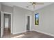 This bedroom offers a light-filled space with hardwood floors and neutral paint at 337 Coffee Pot Ne Dr, St Petersburg, FL 33704