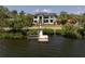 Stunning waterfront home with a private dock and modern architecture at 337 Coffee Pot Ne Dr, St Petersburg, FL 33704