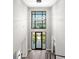 Grand foyer with soaring ceilings, modern lighting, and view to exterior at 337 Coffee Pot Ne Dr, St Petersburg, FL 33704