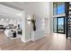 Beautiful foyer featuring soaring ceilings, contemporary decor, and views of the living area at 337 Coffee Pot Ne Dr, St Petersburg, FL 33704
