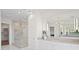 The main bathroom features a walk-in shower and adjacent walk-in closet at 337 Coffee Pot Ne Dr, St Petersburg, FL 33704