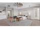 Spacious main bedroom with a ceiling fan, lake views, and an en suite bathroom at 337 Coffee Pot Ne Dr, St Petersburg, FL 33704