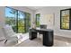 Bright office with large windows providing natural light and view and elegant modern furniture and decor at 337 Coffee Pot Ne Dr, St Petersburg, FL 33704