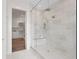 Walk in shower featuring a bench and dual shower heads at 337 Coffee Pot Ne Dr, St Petersburg, FL 33704