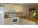 The bright kitchen includes lots of countertop space and a double sink at 34421 Countryside Dr, Wesley Chapel, FL 33543