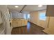 Bright kitchen with wood floors seamlessly connects to the living area at 34421 Countryside Dr, Wesley Chapel, FL 33543