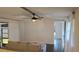 The living room offers space for seating and access to other rooms in the home at 34421 Countryside Dr, Wesley Chapel, FL 33543