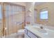 Charming bathroom with unique décor, a vanity with sink, and a themed shower curtain at 4553 31St E Ct, Bradenton, FL 34203