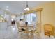 Inviting dining area with a round table and natural light at 4553 31St E Ct, Bradenton, FL 34203