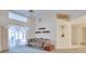 Spacious living room featuring vaulted ceiling, large windows and cozy furniture at 4553 31St E Ct, Bradenton, FL 34203