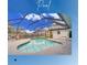 Enclosed screened-in pool with a concrete patio, chairs, and clear blue skies overhead at 4553 31St E Ct, Bradenton, FL 34203