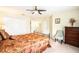 Bedroom with a bed, seating chair, and closet and bright light at 534 19Th Nw St, Ruskin, FL 33570