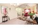 Spacious living room with a view of the staircase, large area rug, and comfortable seating arrangement at 534 19Th Nw St, Ruskin, FL 33570