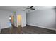 Large, open bedroom with hardwood floors, closet, and ceiling fan at 558 Harbor Ridge Dr, Palm Harbor, FL 34683