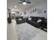 Cozy living room with plush seating, soft rug, and stylish decor throughout at 558 Harbor Ridge Dr, Palm Harbor, FL 34683