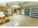 Spacious two car garage with laundry, storage and ceiling fans at 1604 Boswell Ln, New Port Richey, FL 34655