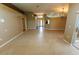 Spacious living room with tile floors, recessed lighting, and a welcoming entrance, perfect for Gathering gatherings at 1604 Boswell Ln, New Port Richey, FL 34655