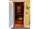 Interior view of an elevator with wood paneled walls and a basket with flowers at 16301 Redington Dr, Redington Beach, FL 33708