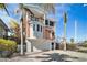 Beautiful home with balcony, and lush landscaping at 206 Church Ave, Bradenton Beach, FL 34217