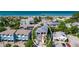 Coastal home boasts vibrant landscaping and ocean views, creating an idyllic beachside setting at 206 Church Ave, Bradenton Beach, FL 34217