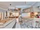 Spacious living room with tile floors, open layout to the kitchen, and a comfortable seating area at 214 Bon Vie Pl, Valrico, FL 33594