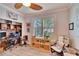 Inviting home office with large window, desk, and comfortable seating at 214 Bon Vie Pl, Valrico, FL 33594