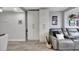 Living room space featuring modern cabinets and a reclining couch at 31 Island Way # 303, Clearwater Beach, FL 33767