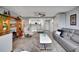 Spacious living area featuring open floor plan to modern kitchen with stylish furnishings and decor at 31 Island Way # 303, Clearwater Beach, FL 33767