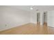 Bright bedroom with bamboo floors, ensuite bathroom and walk-in closet at 3987 Maceachen Blvd # 133, Sarasota, FL 34233
