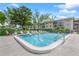 Enjoy this well-maintained, spacious community pool with lounge chairs at 3987 Maceachen Blvd # 133, Sarasota, FL 34233