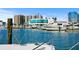 Marina view showcasing docked boats against a backdrop of waterfront buildings at 3987 Maceachen Blvd # 133, Sarasota, FL 34233