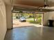 Spacious two car garage with brick paver driveway and a view of the neighborhood at 130 Banyan Bay Dr, St Petersburg, FL 33705
