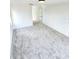 Bright bedroom with plush carpet and white walls at 19018 Geraci Rd, Lutz, FL 33548