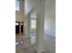 Open foyer with marble floors, soaring ceilings, neutral walls, and lots of natural light at 19018 Geraci Rd, Lutz, FL 33548