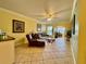 Inviting living room with tiled flooring, neutral paint, and comfortable seating arrangements at 19417 Gulf Blvd # C210, Indian Shores, FL 33785