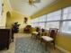 Cozy sunroom with wicker furniture, large windows, and stylish decor at 19417 Gulf Blvd # C210, Indian Shores, FL 33785